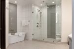 Ultimate spa-like experience with large walk-in shower and relaxing soaking tub.