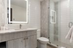 Guest bedroom 3 includes an en suite bathroom with a walk-in shower.