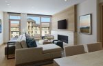 Sectional sofa, work desk, and flat-screen smart TV