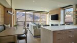 Extra comforts of home include a fully equipped kitchen and living room with fireplace