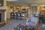 800 Square Feet - Fireplace - Living Room - Dining Table - Bar Stools 
