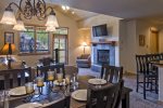 1098 Square Feet - Fireplace - Living Room - Dining Table - Bar Stools 