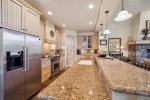 Gourmet Fully Equipped Kitchen with Bar Stools