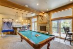 Game Room - Gas fireplace, pool table, Pop-A-Shot basketball game, darts board, wet bar with small refrigerator, dishwasher & microwave