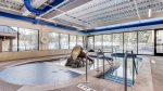 Four Outdoor Hot Tubs, Indoor/Outdoor Swimming Pool, Sauna, Movie room, Steam Room & Fitness Room, common grills located on Plaza level
