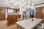 Superb kitchen with Viking and Thermador appliances including a gas range and wine refrigerator