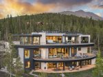 Set amidst the evergreens on 5 private acres