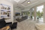A private living room and lounge area allow a generation to pick their favorite movie and hang in their own space.