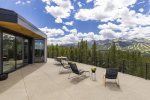 The estate greets with a heated driveway in the winter and a mind-blowing suspended entry canopy.