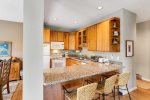 Breakfast bar provides additional seating for guests