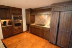 Each residence offers a fully equipped gourmet kitchen w/ bar seating 
