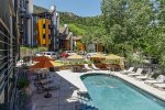 Outdoor heated pool and hot tub with views of Aspen Mountain 