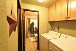 Laundry Room with Full Bathroom On Other Side of It