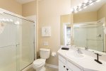 The private master bath has a walkin shower