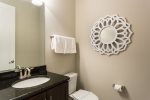 A half bathroom is located on the ground floor