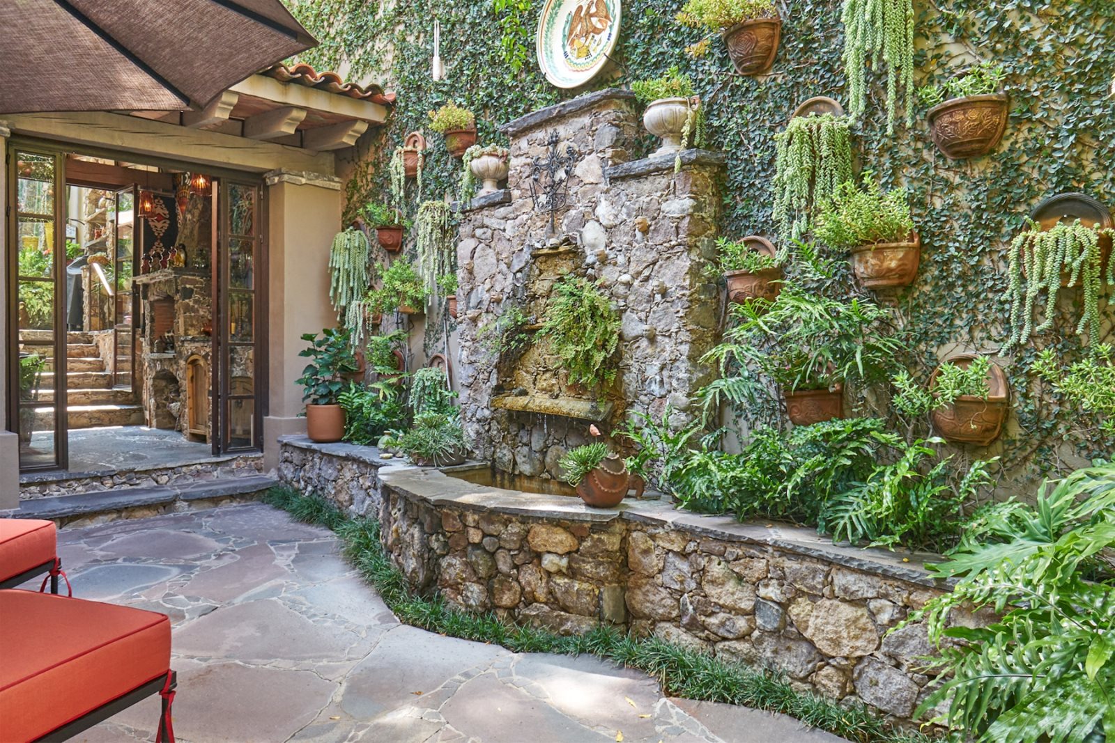 Entry outdoor seating area with fountain