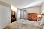 Cozy queen bed and TV in the cabinet