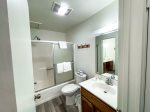 Bathroom with a shower/tub combo