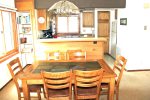 Mammoth Rental Sunrise 51 - Dining Table with 6 Chairs and 2 Bar Stools at Counter