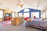 Upstairs Den with two full beds