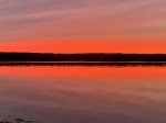 A westerly view across the water offers sunsets on a clear evening