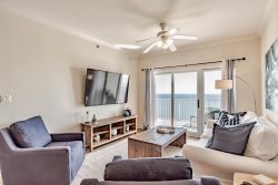 Beautiful beach front condo with recent updates! Outdoor living area on deck!
