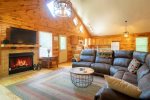 Living Area with Gas Log Fireplace and Smart TV