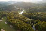 Aerial view showing location on golf course & proximity to downtown Helen