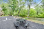 Picnic tables next to river