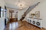 Hallway with stairs to upper level 