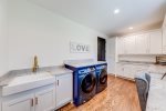 Large sink in laundry room  & lots of space 