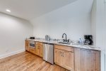 Lost Cabin living area with glass door to balcony