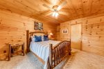 Bedroom with log frame bed