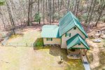 Aerial view of home & fenced yard