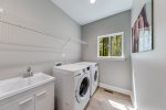 Laundry room with washer & dryer & laundry sink
