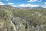 Aerial view of house & mountains