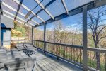 Large back deck with comfy outdoor furniture