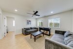 Music room with piano and 2 sofas