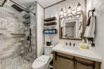 En suite bathroom with tiled walk in shower