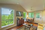 Living area with view of mountains and lake