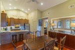 Dining and kitchen bar area has room for everyone