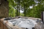 Relaxing hot tub with privacy and mountain view in the skyline