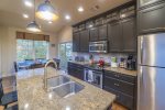 Granite counters & modern stainless appliances