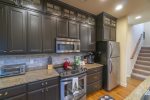 Kitchen is centrally located within the home