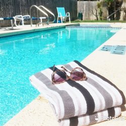 Have fun in the sun at West Oleander 2 bedroom 2 bath pool and hot tub BBQ & sleeps 8 