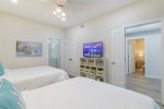 Smart TVs throughout the unit living room & both bedrooms