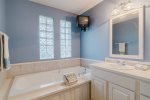 The king guest suite features this beautiful bathroom luxuriate in the tub