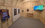 Arcade games, big-screen entertainment, and year-round comfortall in your own game shed.