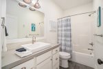 Fresh, Clean, and Ready for You - The Main Level Bathroom is Designed for Relaxation