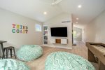 The Upper-level Also Features a Flatscreen Smart TV - Perfect for Family-friendly Flicks